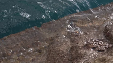 Stone Pier washed by calm Sea Waves. Stock Footage 263078489