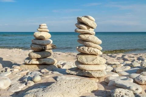 Stone piles on the beach Photos