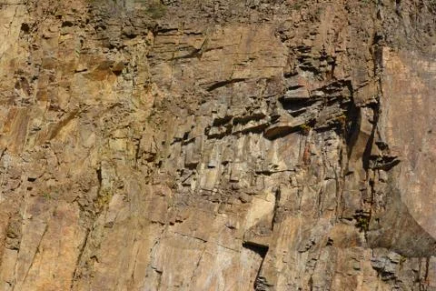 Stone-pit, stone wall Stock Photos
