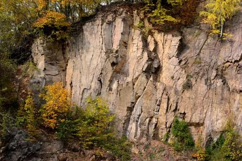 Stone-pit, stonewalls with trees Stock Photos
