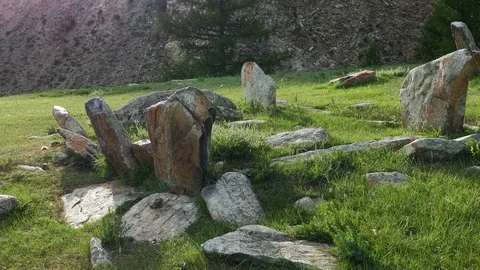 Stone plates of ancient burial structures  Kheregsuurs  in the Mongolia. Stock Footage 90841064