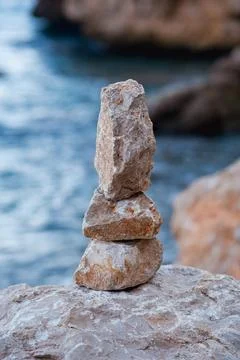 Stone pyramids on the beach 스톡 사진