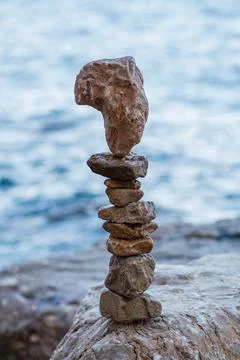 Stone pyramids on the beach 스톡 사진
