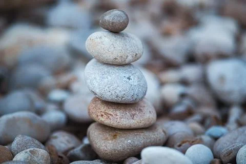 Stone pyramids on the beach 스톡 사진