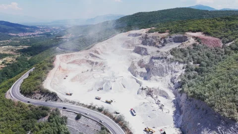 A stone quarry and processing plant with crushing machinery Stock Footage 345264781