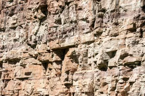 Stone quarry wall Stock Photos