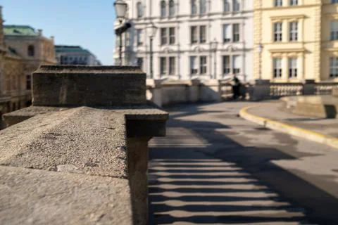 Stone railing and long shadows Stock Photos