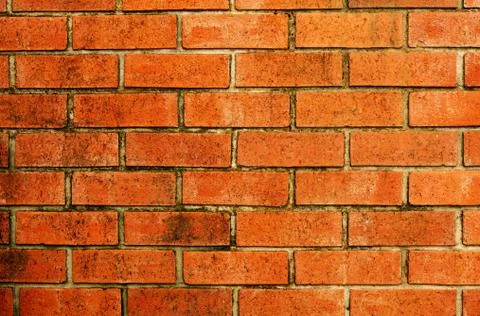 Stone red wall pattern natural surface Stockfoto's