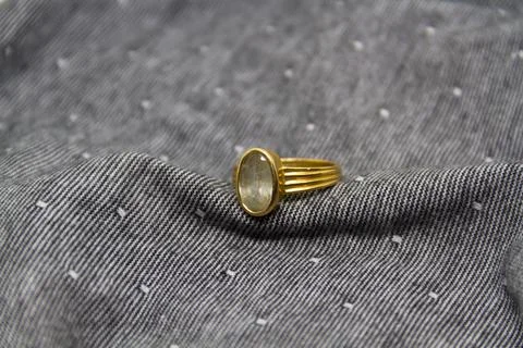 The stone ring with beautiful dote background. Stock Photos