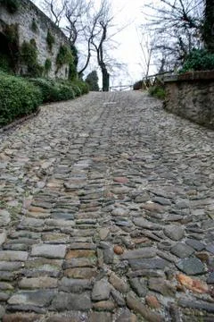 Stone road to the castle Stock Photos