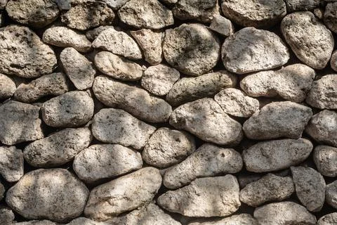 Stone, rock beige wall texture, background.. Stock Photos