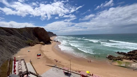 Stone rock at ocean side beach in a summer day. Stock Footage 249955122