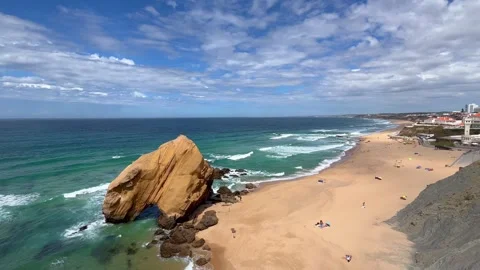 Stone rock at ocean side beach in a summer day. Stock Footage 249955169