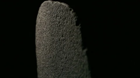 Stone Rotates On Black Background Close-up Stock Footage 93015738