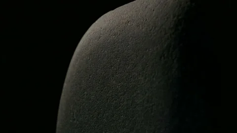 Stone Rotates On Black Background Close-up Stock Footage 93015769