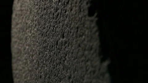 Stone Rotates On Black Background Close-up Stock Footage 93015794