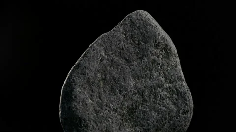 Stone Rotates On Black Background Close-up Stock-Footage 93015972