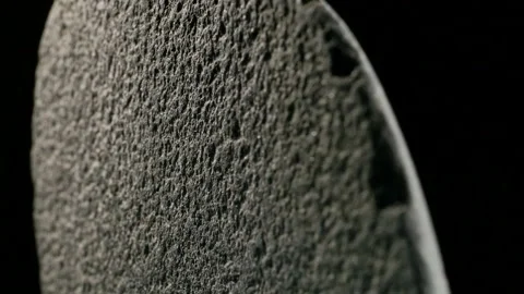 Stone Rotates On Black Background Close-up Stock Footage 93016249