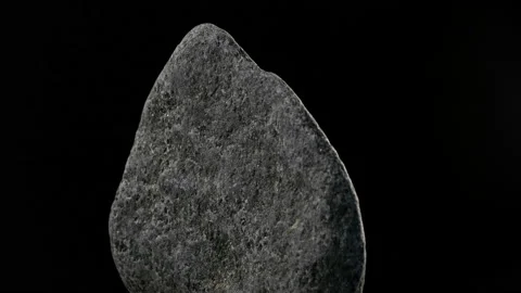 Stone Rotates On Black Background Close-up Stock Footage 93016281