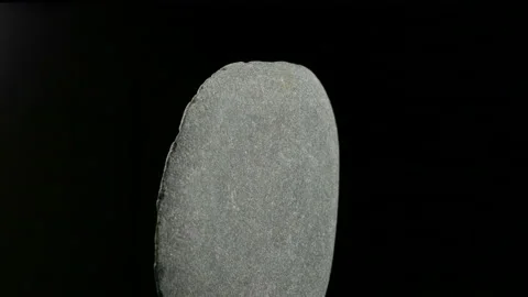Stone Rotates On Black Background Close-up Stock Footage 93016704