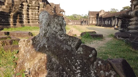 Stone ruins lying on the ground of Angkor Wat Temple in Cambodia. Stock Footage 105879879