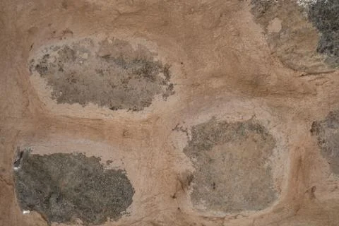 Stone rustic looking wall background Fotos Stock