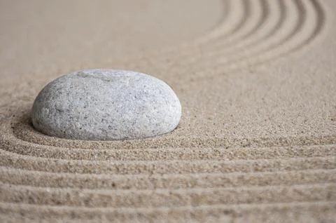 Stone on sand with customizable space for text or message Stock Photos