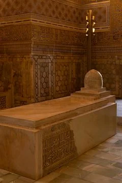 Stone sarcophagus inside Gur-e-Amir mausoleum in Samarkand with ornate Isla.. Stock Photos
