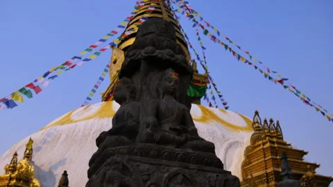 Stone sclupture or statue of Buddha in front of UNESCO Swayambhunath Stock Footage 285820350