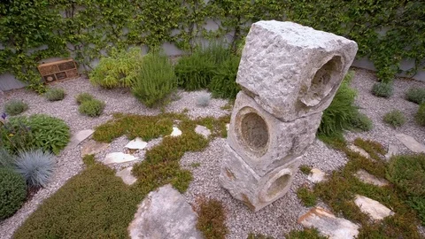 Stone sculpture in the sand   Stock Footage 111023457