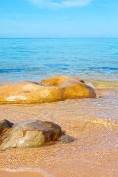 Stone in a sea Stock Photos