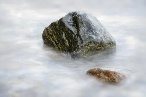Stone in the sea Stock Photos