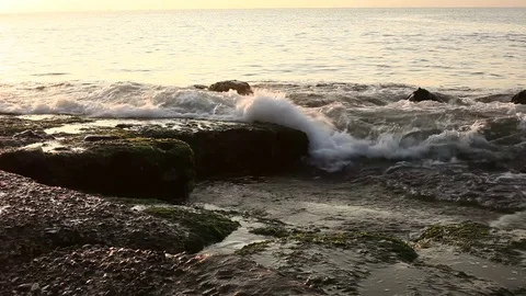 Stone in sea with wave on sunset time 스톡 동영상 75439699