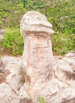 Stone the shape of a penis. Stock Photos