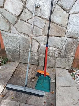 Stone sidewalk cleaning tools Stock Photos