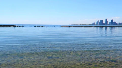 Stone skipping Stock Footage 75654842