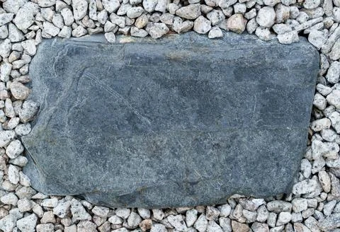 Stone slab with smaller stone background Stock Photos