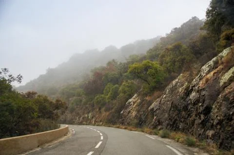 Stone slopes by the road. Stock Photos