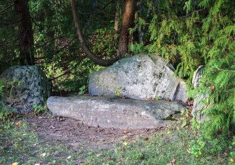 Stone sofa in old park Stock Photos