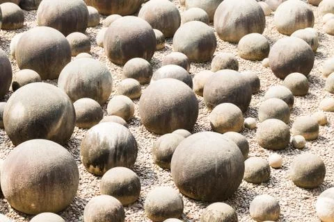 Stone sphere in garden Stock Photos