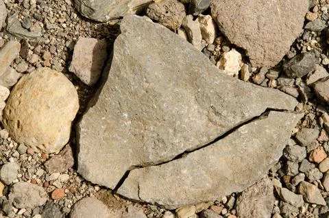 Stone split by the effect of atmospheric agents. Stock Photos