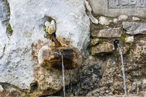 Stone spring with clear water Foto stock