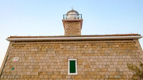 Stone St. Peter lighthouse on Adriatic sea in Makarska riviera in Croatia Stock Photos