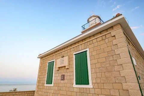 Stone St. Peter lighthouse on Adriatic sea in Makarska riviera in Croatia Stock Photos