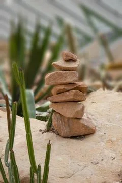 Stone stack in a garden Stock Photos