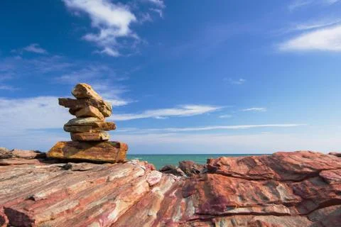 Stone stack stable and wave splash on background Stock Photos