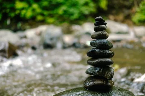 Stone Stack by Stream Balance and Zen. Stock Photos
