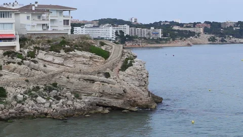 Stone staircase to wild beach at sunset Video stock 90532018