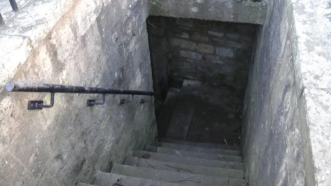 Stone Stairs to Basement in Castle Stock Footage 104349870