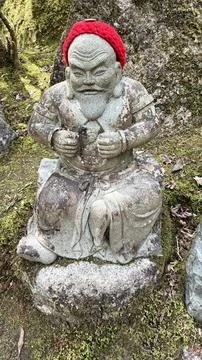 Stone statue of a Buddhist deity Stock Photos